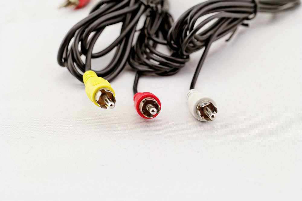 Three RCA cables and plug 