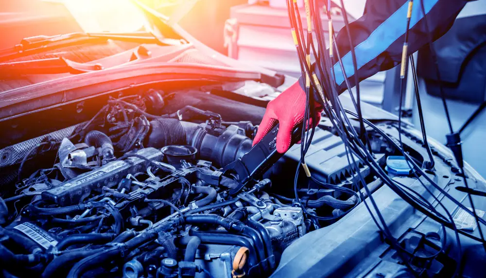 Wire harnesses and cable assemblies under the hood